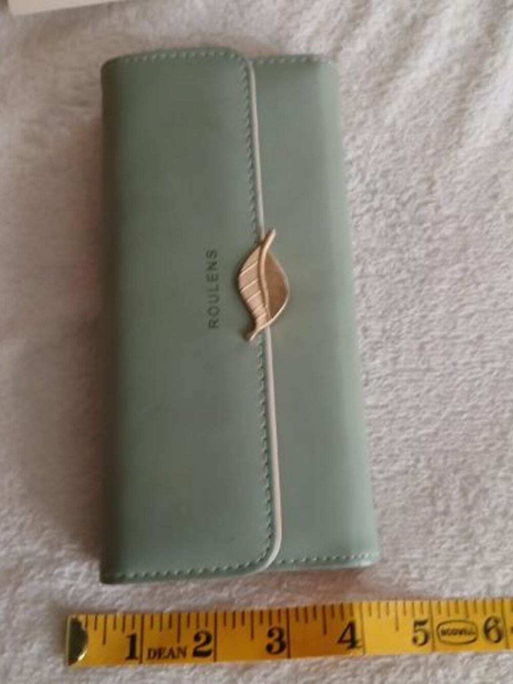 Roulens wallet with gold accents
